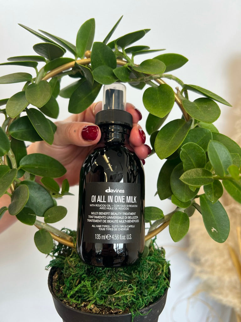 apply-davines-oi-milk-to-hair